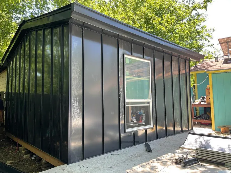 Black standing seam metal wall panels for Metal Roof Installation in Rock Island