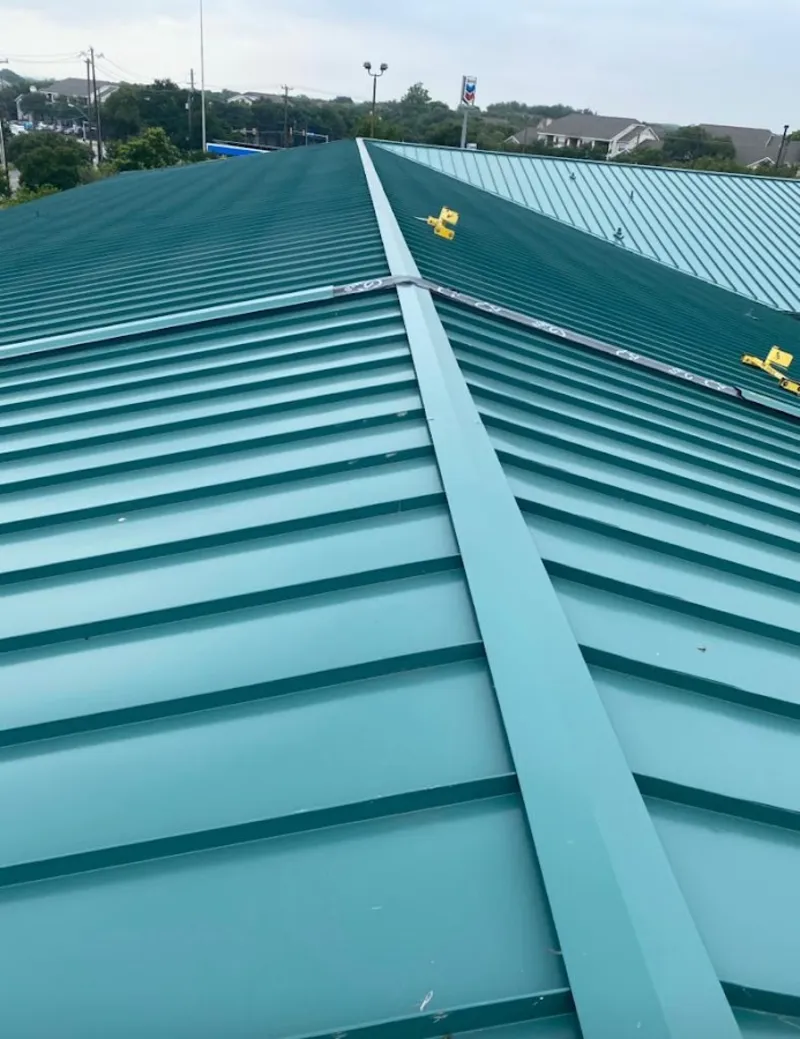 Green commercial metal roof ridge and valley for Metal Roof Repair in Rock Island